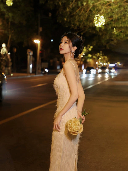 Thirteen and Little French suspender dress for women, summer slim-fitting waist and back slit, elegant and high-end fringed skirt