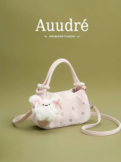 Auudre niche design pleated pink handbag for women, new summer 2026 style, fashionable crossbody bag.