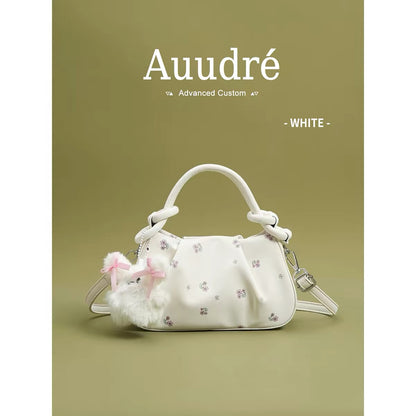 Auudre niche design pleated pink handbag for women, new summer 2026 style, fashionable crossbody bag.