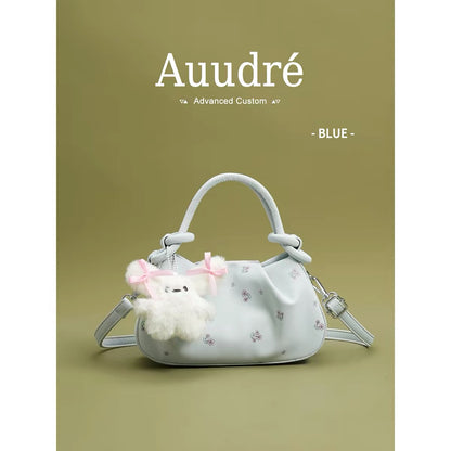 Auudre niche design pleated pink handbag for women, new summer 2026 style, fashionable crossbody bag.
