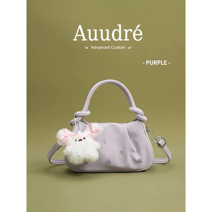 Auudre niche design pleated pink handbag for women, new summer 2026 style, fashionable crossbody bag.
