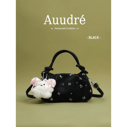 Auudre niche design pleated pink handbag for women, new summer 2026 style, fashionable crossbody bag.