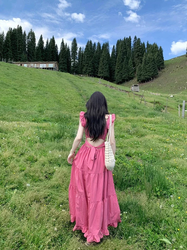 Dopamine wear small flying sleeve dress female summer 2025 new runaway princess seaside vacation backless long dress