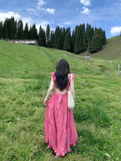 Dopamine wear small flying sleeve dress female summer 2025 new runaway princess seaside vacation backless long dress