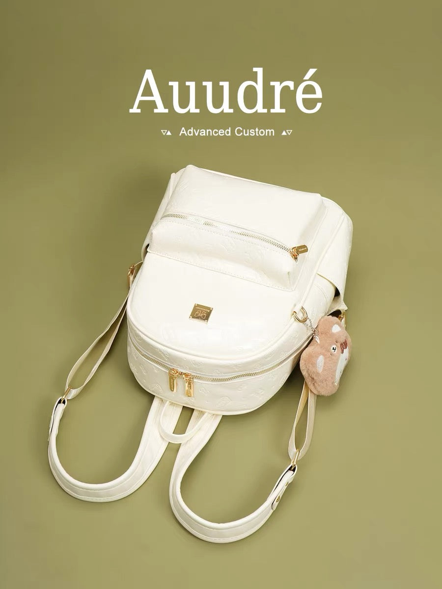 Auudre premium-quality preppy style backpack for women, 2026 new summer fashion travel bag.