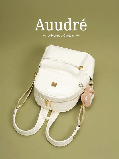Auudre premium-quality preppy style backpack for women, 2026 new summer fashion travel bag.