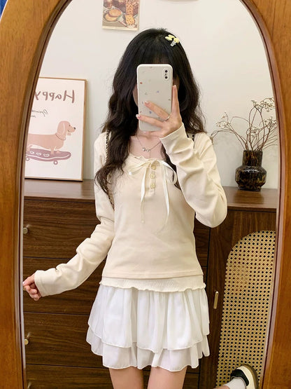 Cream Universe Bow fake two-piece apricot bottoming long-sleeved T-shirt women's sweet and gentle knitted top new style