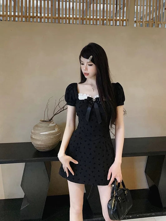 French pure desire bow stitching black dress women's waist temperament design high-grade a-line short skirt summer