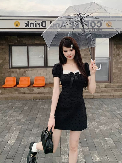 French pure desire bow stitching black dress women's waist temperament design high-grade a-line short skirt summer