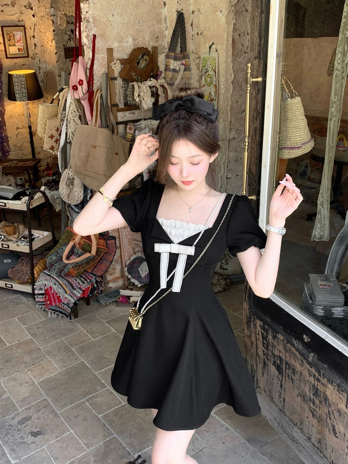Q female home ancient new noble / miu series rich daughter feeling Hepburn style black dress female summer bow short skirt