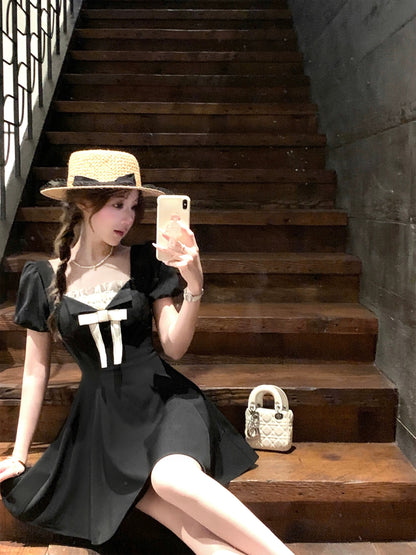 Q female home ancient new noble / miu series rich daughter feeling Hepburn style black dress female summer bow short skirt