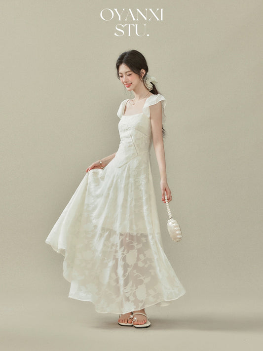 Ouyang Xi's "Glass Feathers" 2025 Summer New Arrival: A square-neck, fitted dress with flutter sleeves for women.
