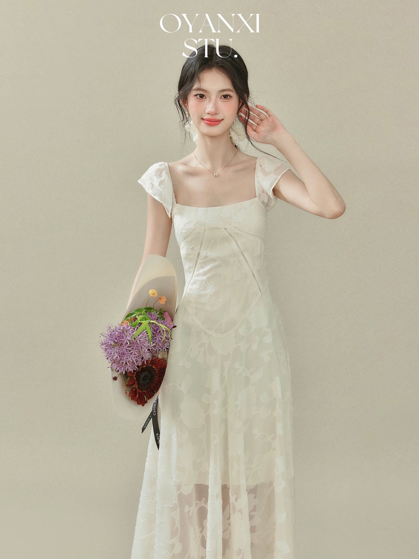 Ouyang Xi's "Glass Feathers" 2025 Summer New Arrival: A square-neck, fitted dress with flutter sleeves for women.