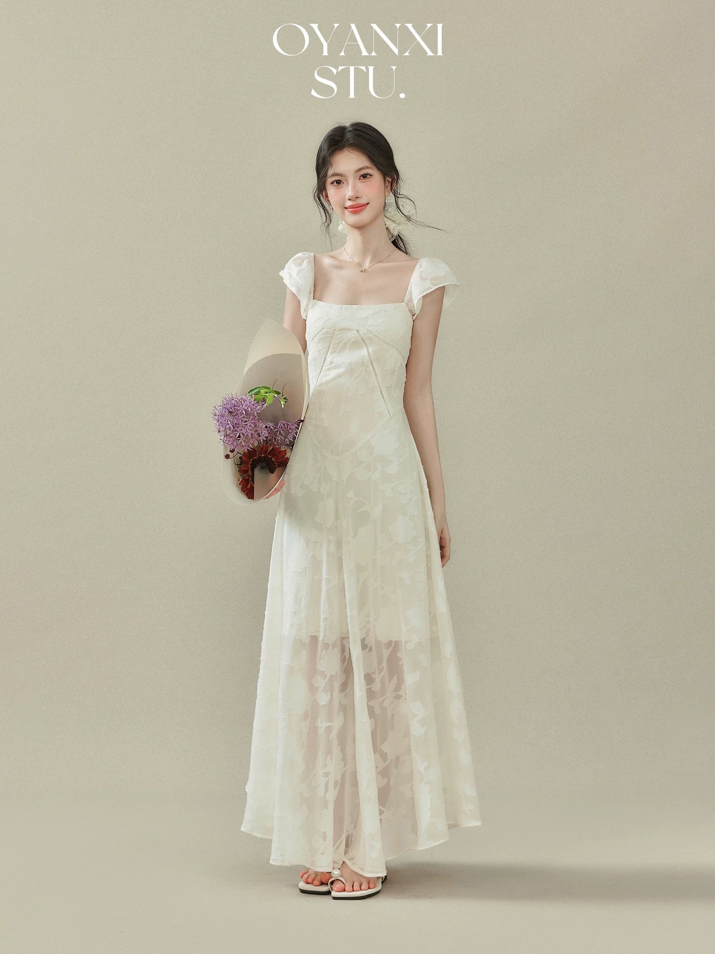 Ouyang Xi's "Glass Feathers" 2025 Summer New Arrival: A square-neck, fitted dress with flutter sleeves for women.