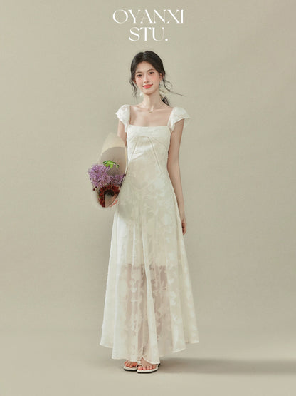 Ouyang Xi's "Glass Feathers" 2025 Summer New Arrival: A square-neck, fitted dress with flutter sleeves for women.
