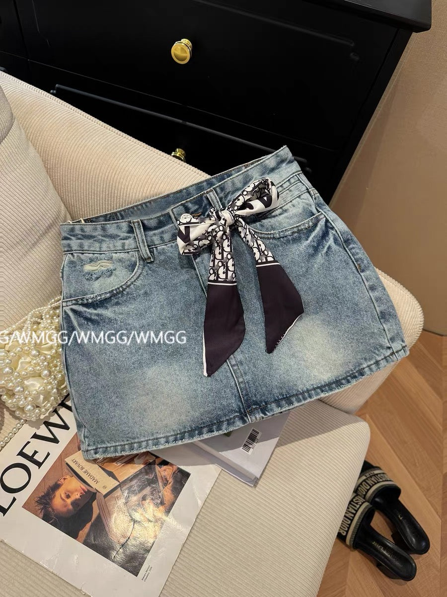 Blue denim mini skirt with bow design, new summer 2026 style, high-waisted, sexy, anti-exposure A-line skirt.