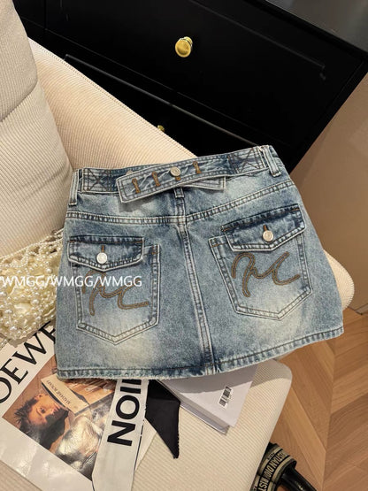 Blue denim mini skirt with bow design, new summer 2026 style, high-waisted, sexy, anti-exposure A-line skirt.