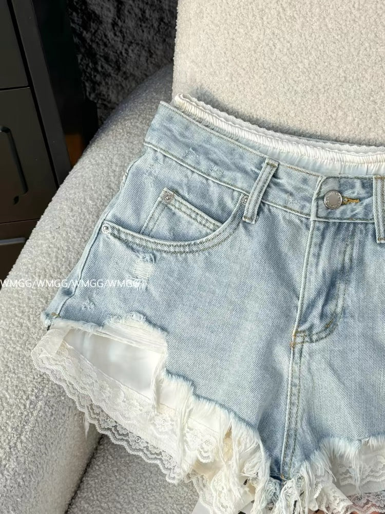 Light blue denim shorts for women, super trendy in 2026, featuring ripped details, patchwork lace trim, and sexy hot pants.