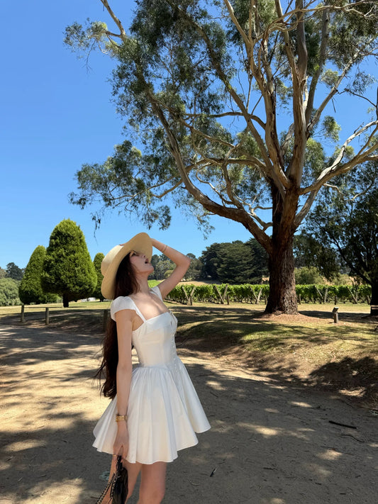 yangzifan White slip dress, women's summer off-shoulder French design A-line puffy short skirt