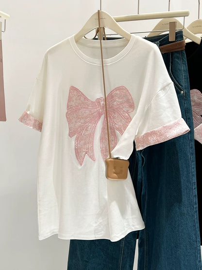 Black bow right shoulder short-sleeved T-shirt for women loose heavy industry embroidery summer unique and unique contrasting color splicing top