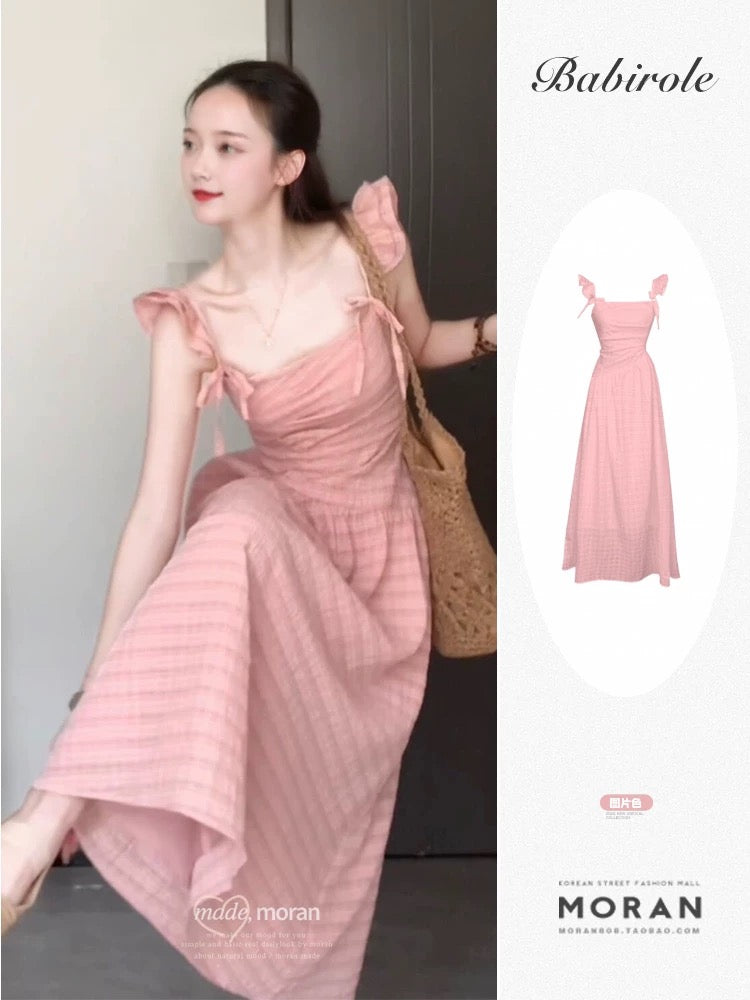 French temperament gentle pink small flying sleeve dress summer 2025 new waist seaside holiday fairy long dress