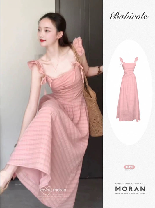French temperament gentle pink small flying sleeve dress summer 2025 new waist seaside holiday fairy long dress