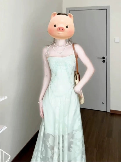 French retro mint green suspender dress for women summer 2025 new summer beautiful seaside holiday style long dress