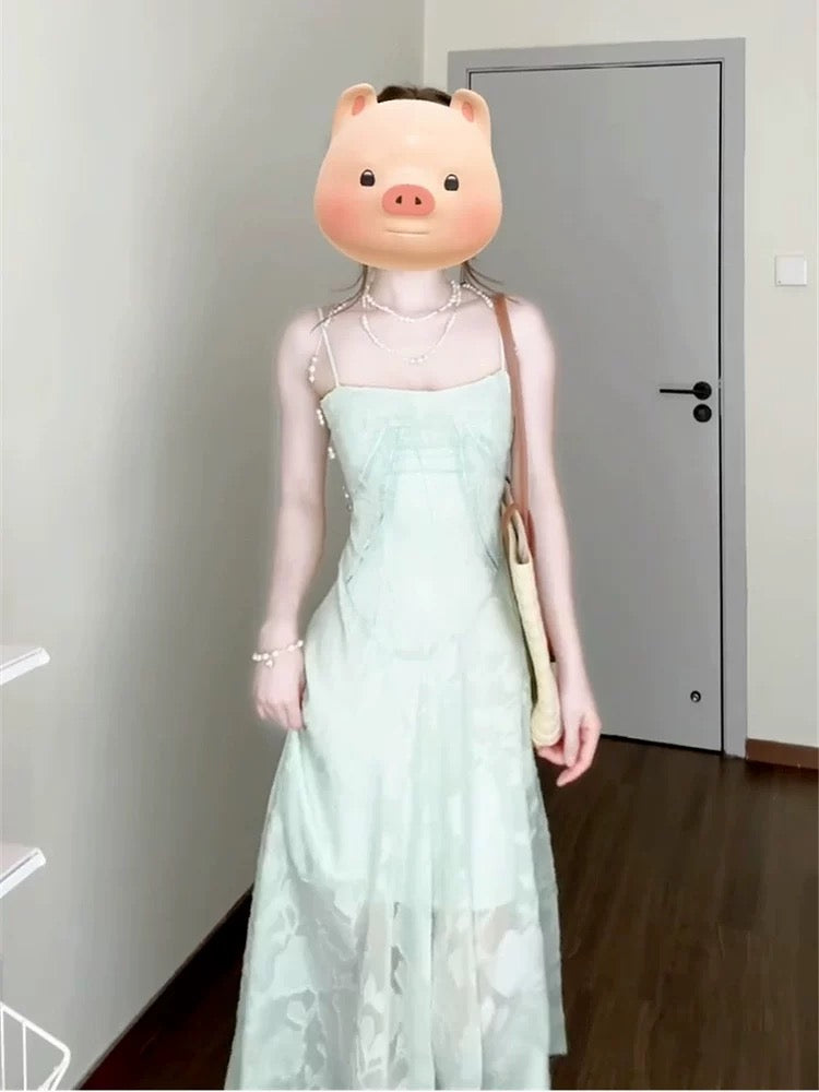 French retro mint green suspender dress for women summer 2025 new summer beautiful seaside holiday style long dress