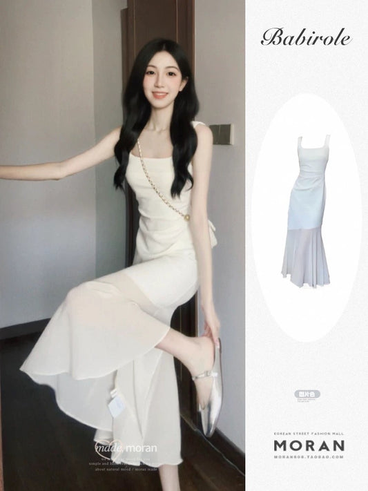 French sleeveless suspender white dress for women 2025 new summer seaside vacation fishtail long dress high-end