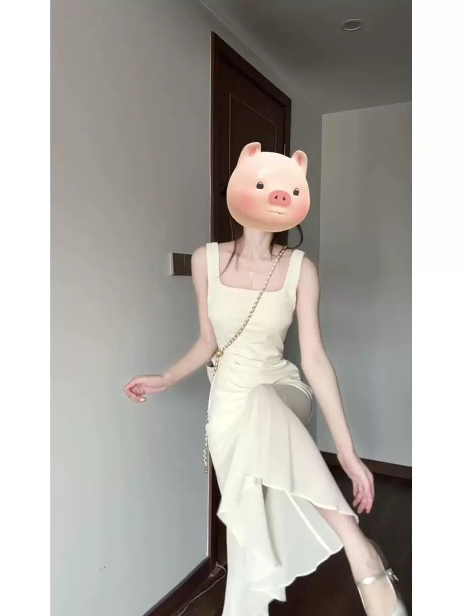 French sleeveless suspender white dress for women 2025 new summer seaside vacation fishtail long dress high-end