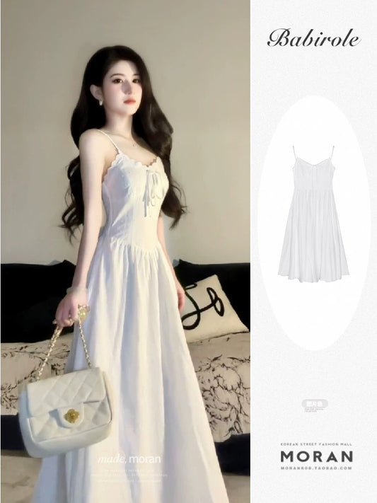 French style white suspender dress for women 2025 summer new style wear temperament waist seaside holiday style long dress