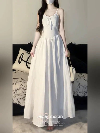 French style white suspender dress for women 2025 summer new style wear temperament waist seaside holiday style long dress