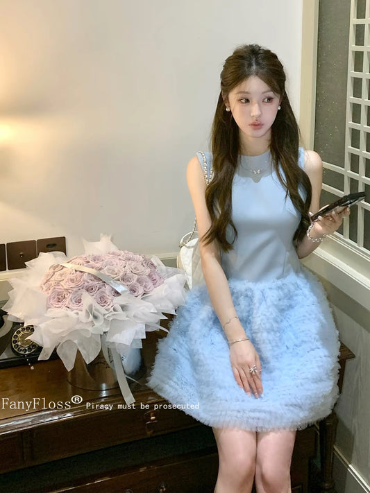 FanyFloss's court-style sleeveless tulle-panel chic cake dress with French flair, high-waisted, slimming, and flared skirt.