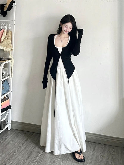 Early autumn wear a complete set of high-end black cardigan with temperament white dress salty mature two-piece suit