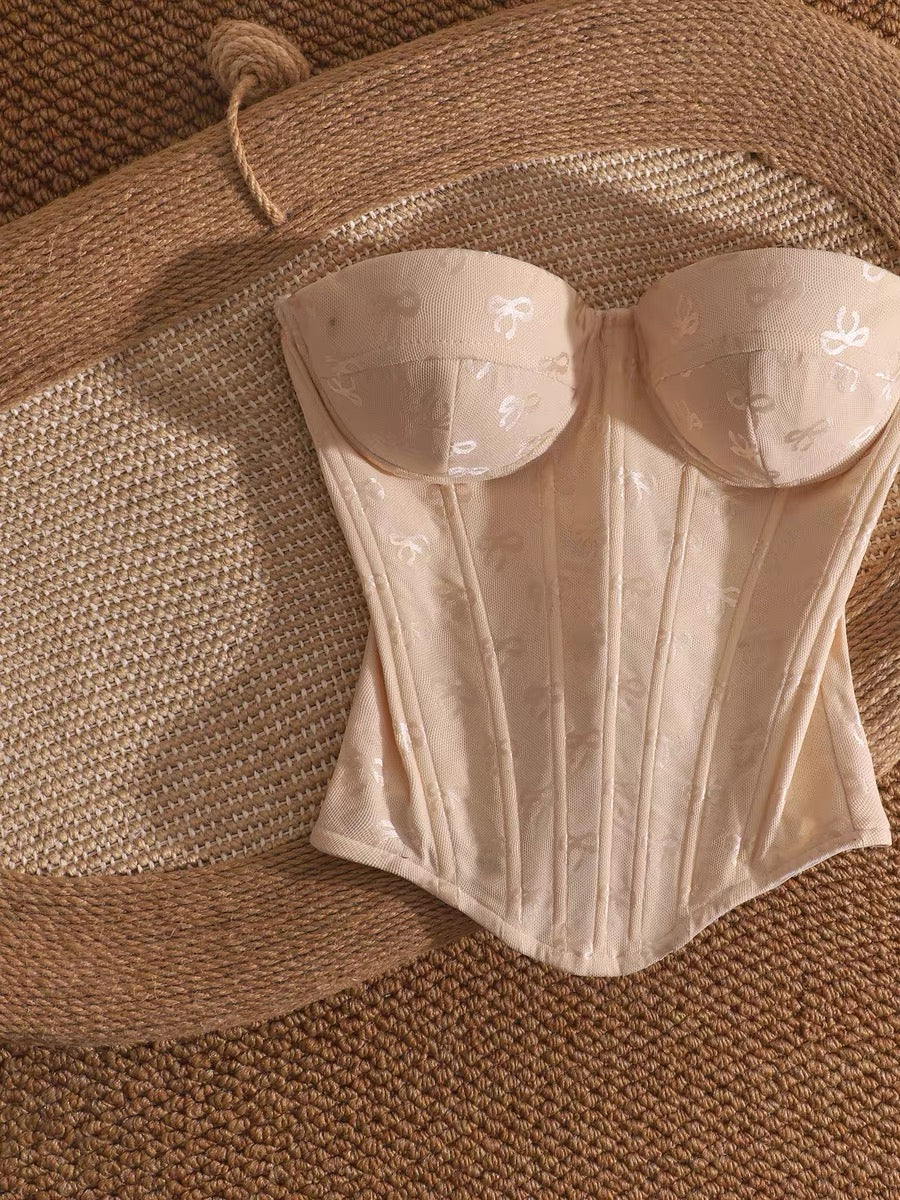 Pure and alluring off-the-shoulder fishbone bralette top with bow print, perfect for layering or wearing alone, slimming and flattering.