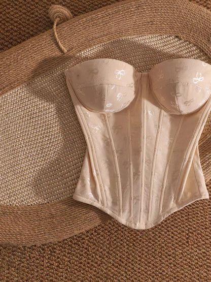 Pure and alluring off-the-shoulder fishbone bralette top with bow print, perfect for layering or wearing alone, slimming and flattering.
