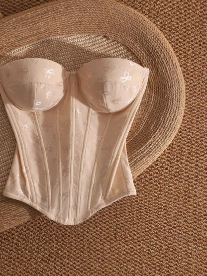 Pure and alluring off-the-shoulder fishbone bralette top with bow print, perfect for layering or wearing alone, slimming and flattering.
