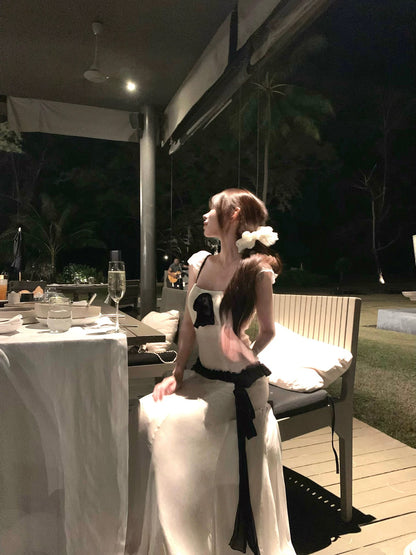 Suuuicee Moonlit Tango: Gathered details and three-dimensional tailoring; contrasting color bow on a pure and alluring slip dress.