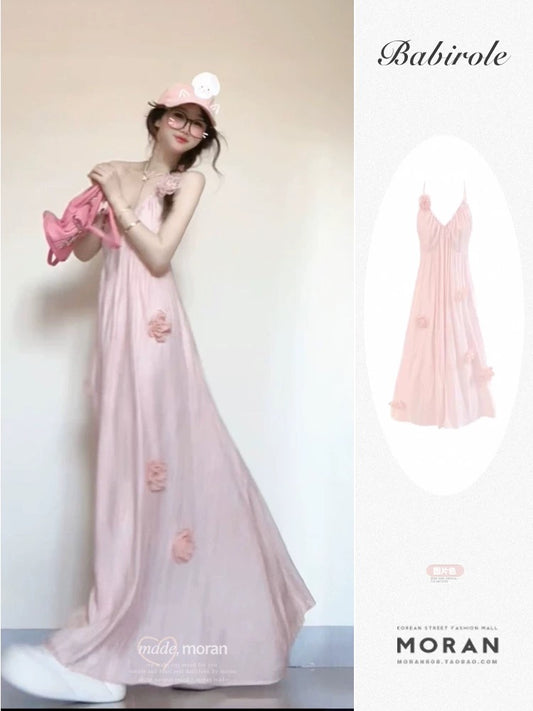 French-style beach maxi dress, 2025 summer new style, pink floral V-neck fairy-like suspender dress.