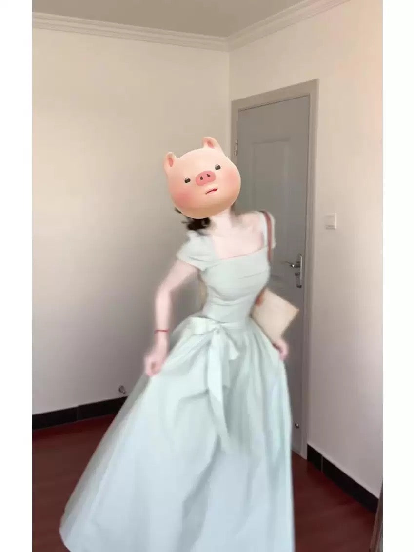 French-style fresh blue short-sleeved square neck dress, perfect for summer, with a beautiful bow, slimming waist, and elegant long dress.