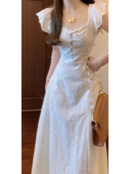 French-style exquisite white dress, perfect for first love, exuding sophistication, sweetness, purity, uniqueness, and a beautiful fitted waist.
