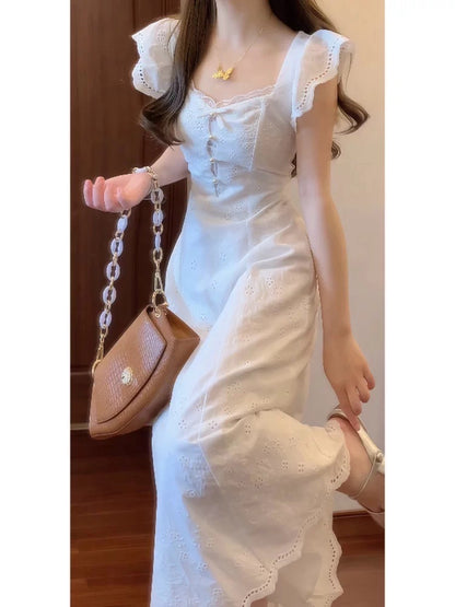 French-style exquisite white dress, perfect for first love, exuding sophistication, sweetness, purity, uniqueness, and a beautiful fitted waist.