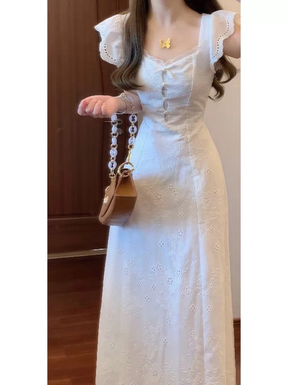 French-style exquisite white dress, perfect for first love, exuding sophistication, sweetness, purity, uniqueness, and a beautiful fitted waist.