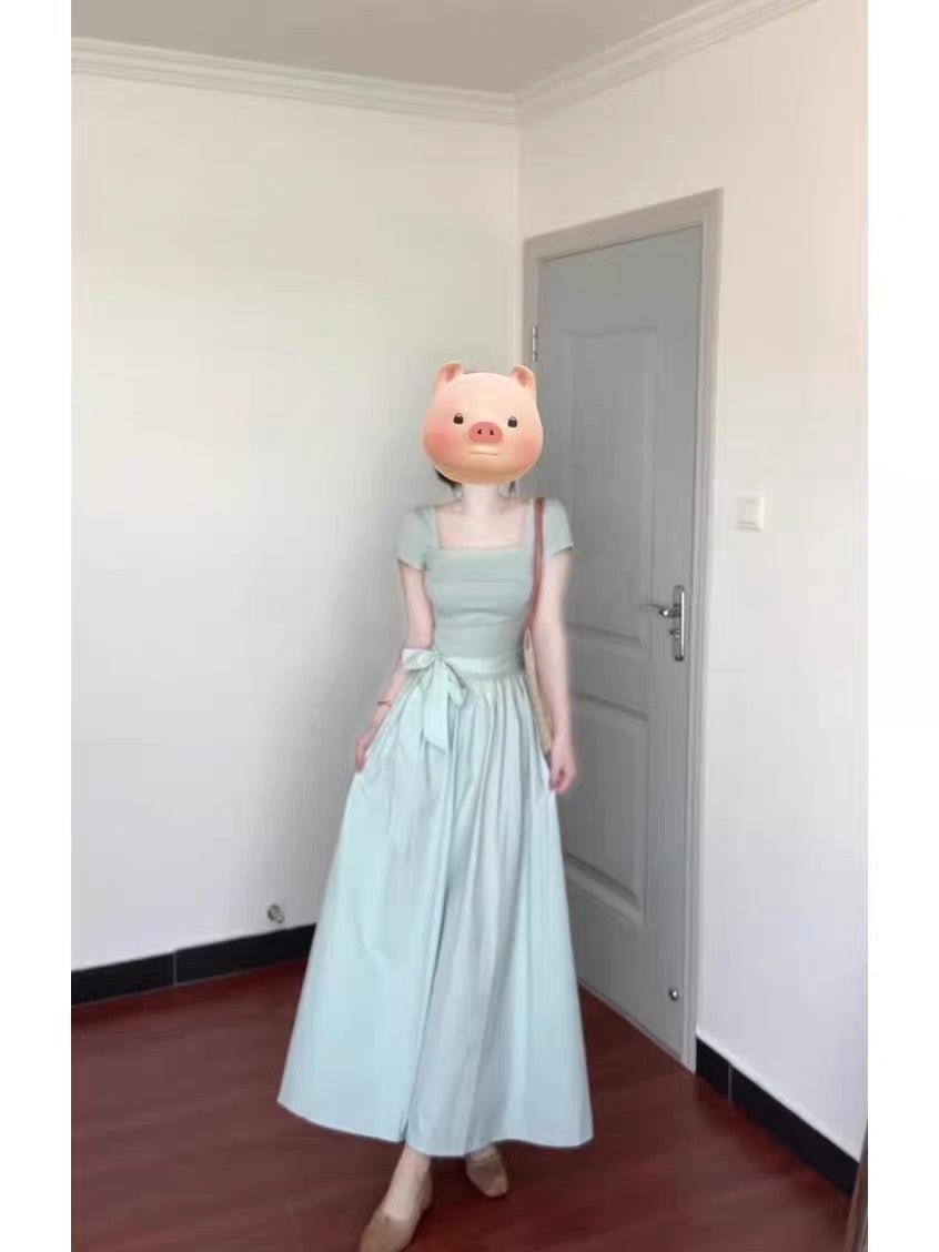 French-style fresh blue short-sleeved square neck dress, perfect for summer, with a beautiful bow, slimming waist, and elegant long dress.