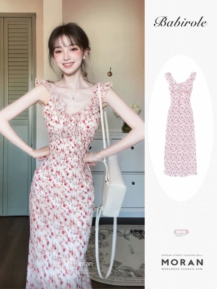 French-style sweet floral print sundress with flutter sleeves, new summer 2025 style, elegant long dress for beach vacation.