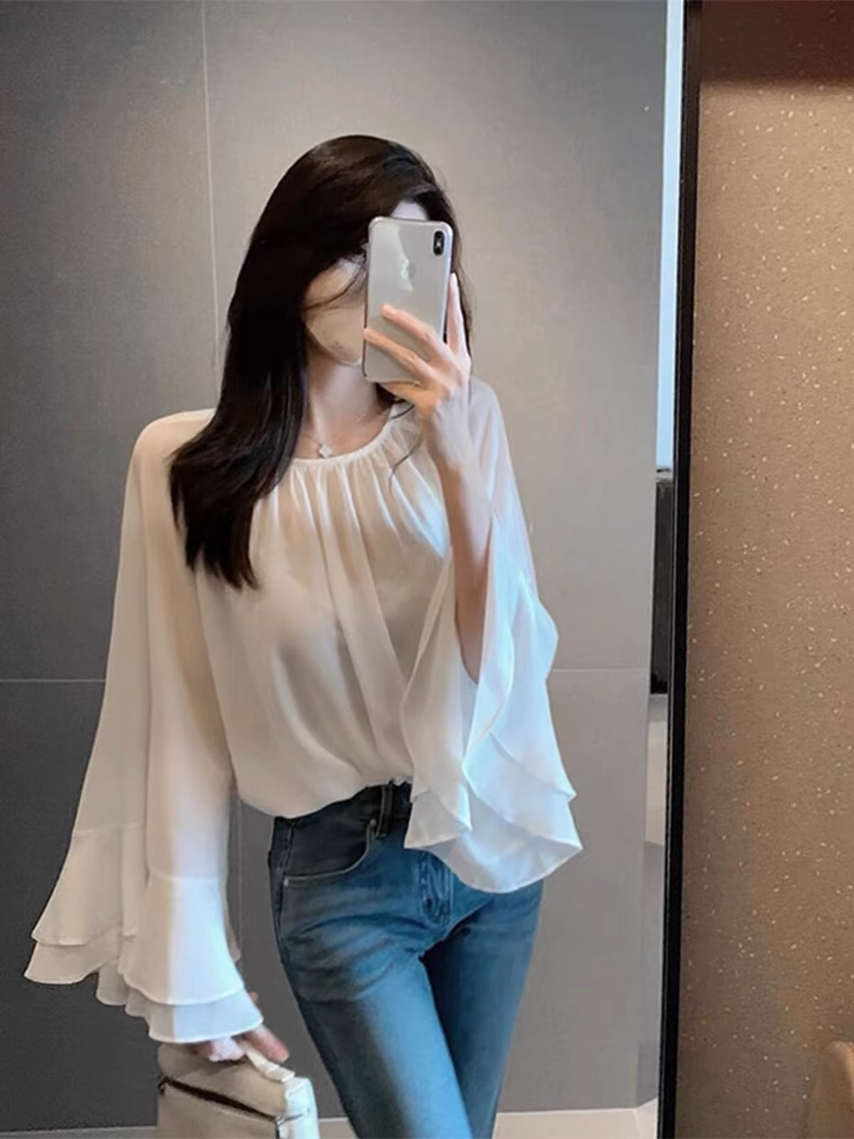 Stunning white women's chiffon blouse—a gorgeous, premium-feel, "quiet luxury" style piece from the Autumn 2026 collection, perfect for layering.