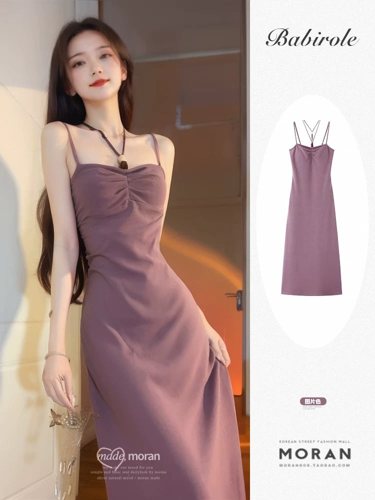 French-style halter-neck maxi dress for women, perfect for summer. A sophisticated and elegant look with a flattering, slimming fit.