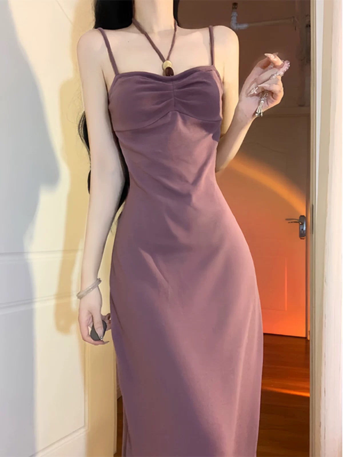 French-style halter-neck maxi dress for women, perfect for summer. A sophisticated and elegant look with a flattering, slimming fit.