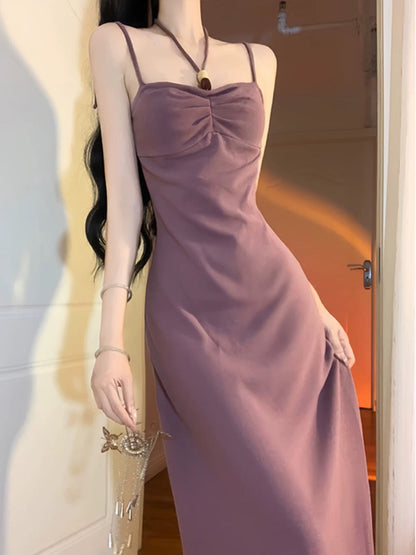 French-style halter-neck maxi dress for women, perfect for summer. A sophisticated and elegant look with a flattering, slimming fit.