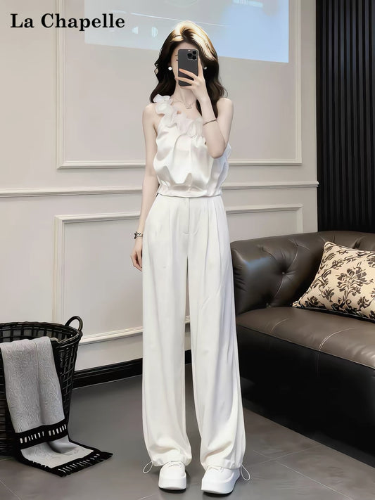 La Chapelle French-style "innocent-yet-alluring" two-piece set: featuring a lace-trimmed, asymmetrical-neckline top and high-waisted, slimming wide-leg trousers—a stylish, casual ensemble.